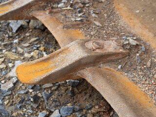 Close-up of a bulldozer blade, detachable rusty steel spike.
