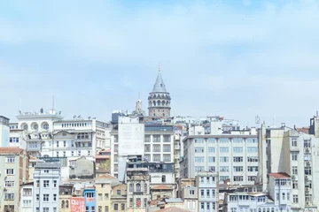 Fototapeten Galata tower photo with a clear blue sky, View of İstanbul.  Represent Turkish architectur and culture. © Bilal