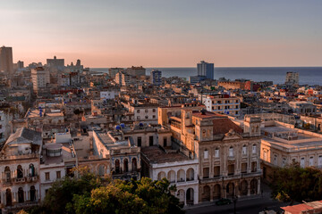 Fototapeta na wymiar View over the rooftops of Havana in Cuba at sunset with the El National hotel