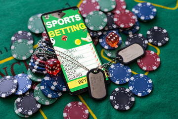 army badge, smartphone with sports betting