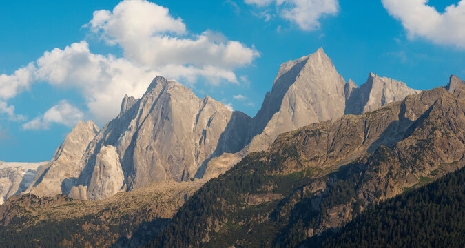 The Piz Badile, Pizzo Cengalo peaks in the Bregaglia range - Switzerland in evening light.