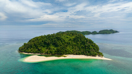 Top view of tropical islands and blue ocean. Seascape in the tropics. Agutaya and Danjugan islands, Philippines.