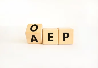 Deurstickers AEP or OEP symbol. Concept words AEP annual enrollment period OEP open enrollment period. Beautiful white table white background. Medical annual or open enrollment period concept. Copy space. © Dzmitry