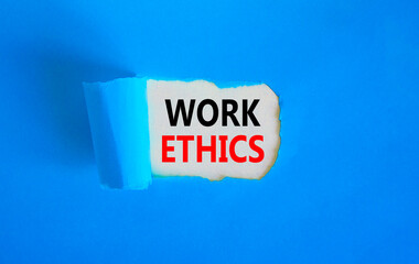 Work ethics symbol. Concept words Work ethics on beautiful white paper. Beautiful blue table blue background. Business and Work ethics concept. Copy space.