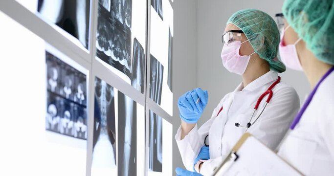 Doctors unsuccessfully providing medical care to dying patient with coughing fit due to pneumonia in clinic 4k movie slow motion. Death of patients with covid19 resuscitation concept