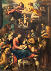 GENOVA, ITALY - MARCH 6, 2023: The painting of Nativity With the St. Francis in the church  Basilica della Santissima Annunziata del Vastato by Guglielmo Caccia - Moncalvo (1568 - 1625).