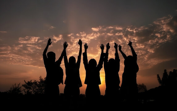 A group of successful young people hold hands at sunset, together they raise their upper hand. Successful team and team building concept. Generative ai