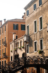 Buildings with yellow walls in old city in sunny day