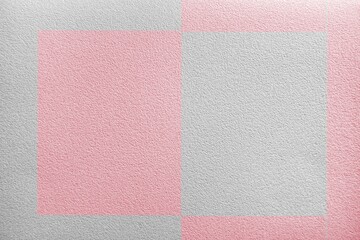 The texture of the pastel pink paper background