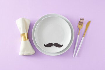 Father's Day table setting concept. Top view flat lay of white plate cutlery knife fork fabric napkin and black mustache on light violet background with space for text or greeting