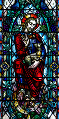 Jesus Christ the good shepherd in stained glass