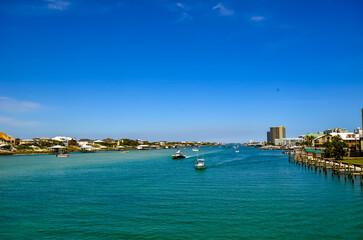 Fototapeta premium Beautiful turquoise water in Old River, seen from Ono island bridge during late April, Orange Beach, Alabama