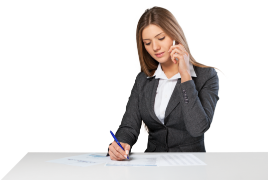 Business woman sitting at the white table and make notes
