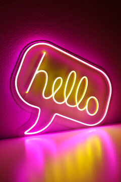 Pink and yellow neon sign hello. Trendy style. Hello. Neon sign. Custom neon. Home decor.