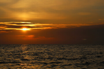 Sunset on Mediterranean Sea. Cloudy day.