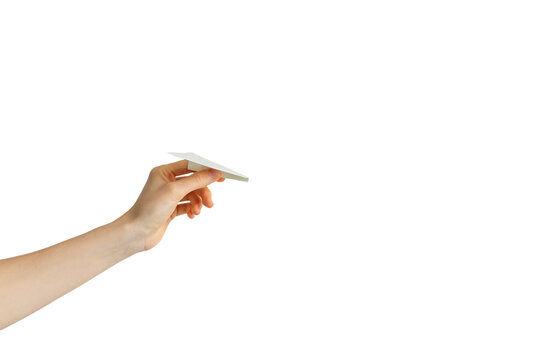 hand holding a paper airplane