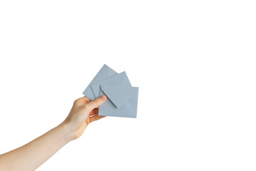 hand holding an envelope. the concept of sending a letter with a message. delivery of the letter.