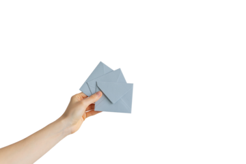 hand holding an envelope. the concept of sending a letter with a message. delivery of the letter.