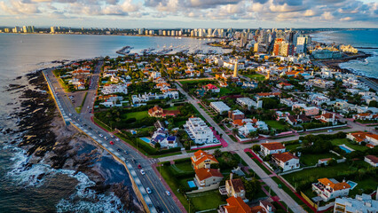 Sunlit Punta del Este coastline waterfront skyscraper resort city landscape Uruguay skyline aerial...