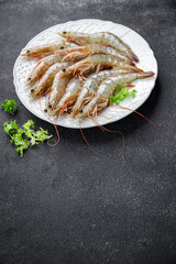 shrimps raw seafood prawn healthy meal food snack on the table copy space food background rustic top view