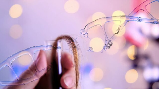 laboratory assistant examines hair sample, curls in package for research by genetic research in laboratory, trichologist conducts test, concept of DNA analysis, establishing paternity, genome research