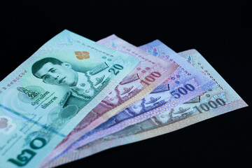 Thai baht banknotes. Cash money of Thailand. Thai economy and financial system concept.