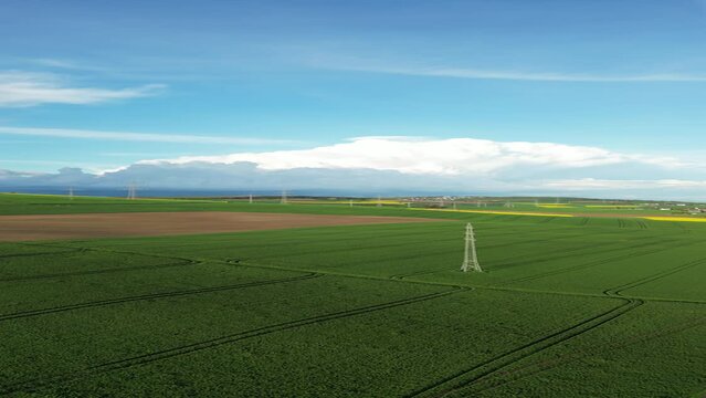 Aerial View of Agriculture Fields with Cloudy Sky