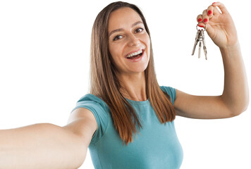 Happy woman of buying flat show key buyer wish to keep in memory moving to new home take selfie on...