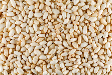 Crisped puffed rice cereal as background texture - close-up