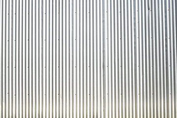 Obraz premium Bright silver corrugated metal sheet background