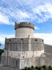 Fototapeta na wymiar Ancient stone tower of Minceta against the sky. Dubrovnik, Croatia