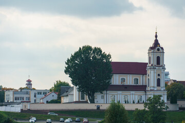 Fototapeta na wymiar An ancient old church. Famous ancient buildings of Belarus. Historical and cultural value. The Temple of God, a place of worship for Catholic saints.