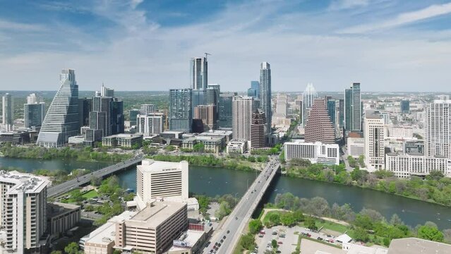 Scenic Austin skyline panorama. Aerial view of downtown, Beautiful urban landscape of green scenic Texas city. Business city tall buildings at Colorado river 4K. Downtown Austin at sunny summer day