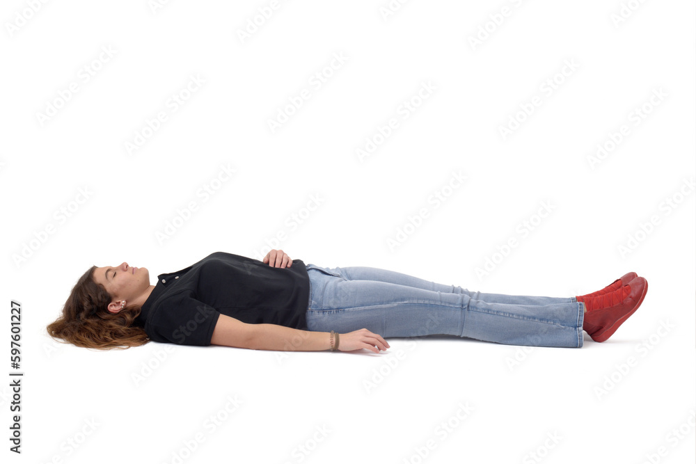 Wall mural young girl lying on the floor on white background