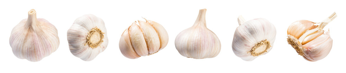 Falling peeled garlic cloves isolated on white background with clipping path. Food and spices objects for design. Spicy and fragrant seasoning concept