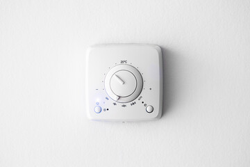 thermostat climate control, close-up view, white background