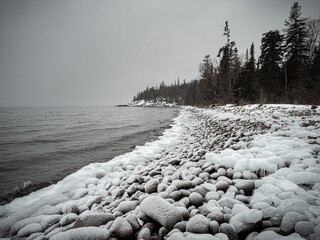 Rocks covered with ice on a cold winter day along the shore of lake Superior