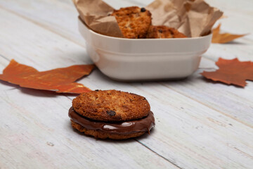 Tasty Chocolate Cookies; Photo On Wooden Background