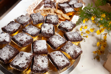 Tasty Chocolate Brownies, Portions With Powdered Sugar on Top.