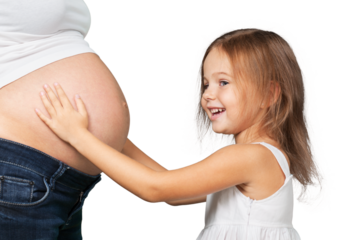 Happy child holding belly of the pregnant mother