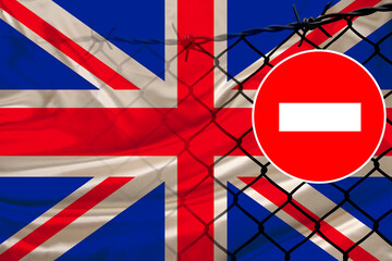Great Britain flag, fence with barbed wire, symbolic red sign no entry, entry is prohibited, travel...