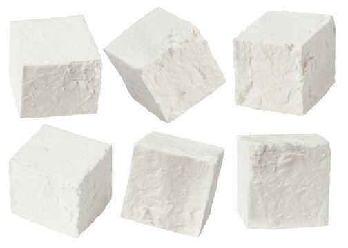 Feta, Greek cheese cubes, isolated on white background, full depth of field