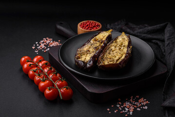 Delicious eggplant cut into two halves baked with salt, spices and herbs
