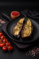 Delicious eggplant cut into two halves baked with salt, spices and herbs