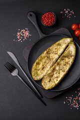 Delicious zucchini cut into two halves baked with salt, spices and herbs