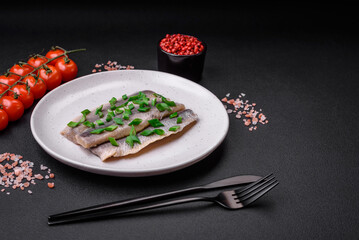 Delicious Atlantic herring marinated with salt and spices