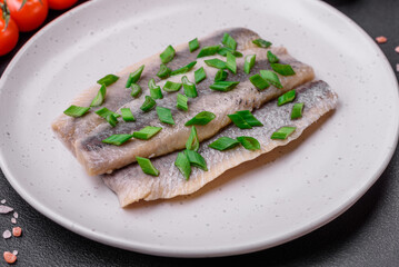 Delicious Atlantic herring marinated with salt and spices