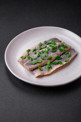 Delicious Atlantic herring marinated with salt and spices