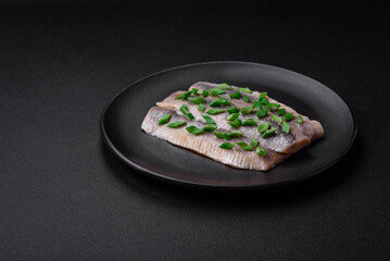 Delicious Atlantic herring marinated with salt and spices
