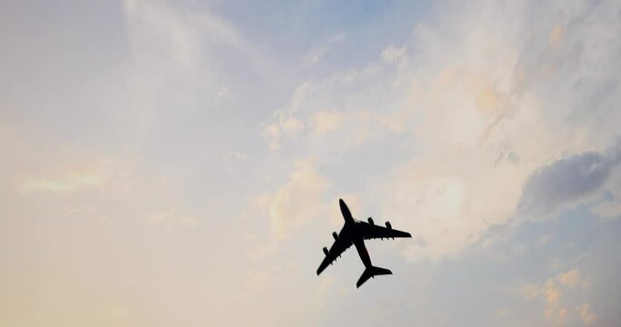 Overhead Flying Aircraft In The Blue Sky. The Plane With The Logo Express Delivery Service. The Sky And The Plane
